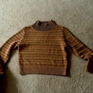 Stevie Hender brown sweater